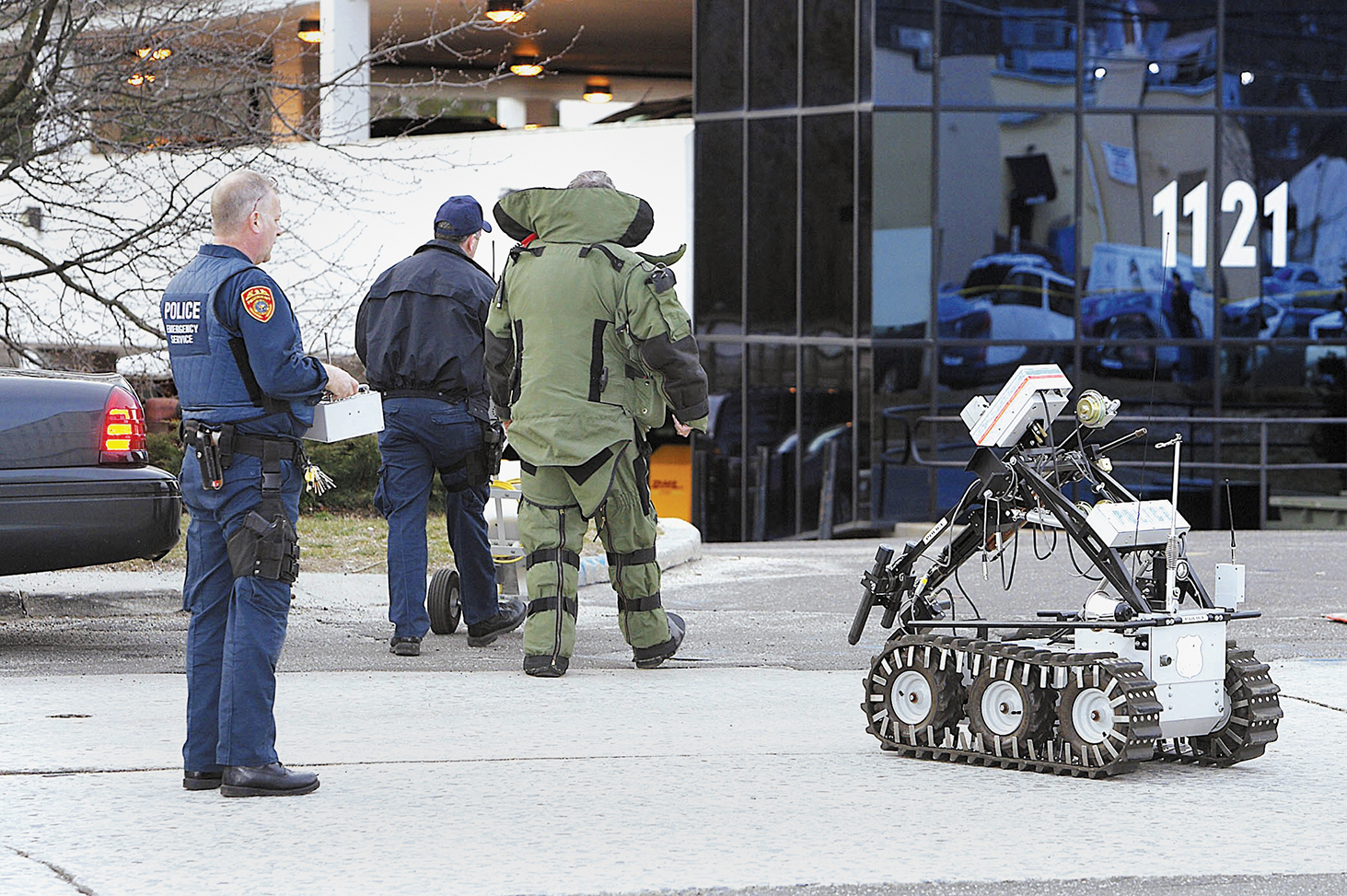 SCPD bomb squad with a disarming robot
